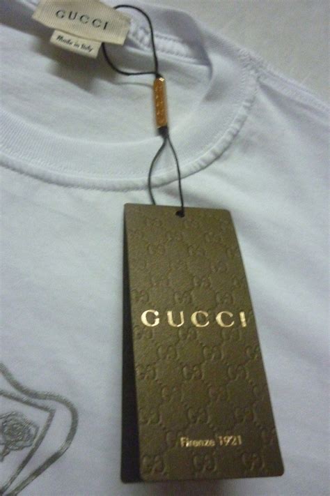 etiqueta de autentica gucci.